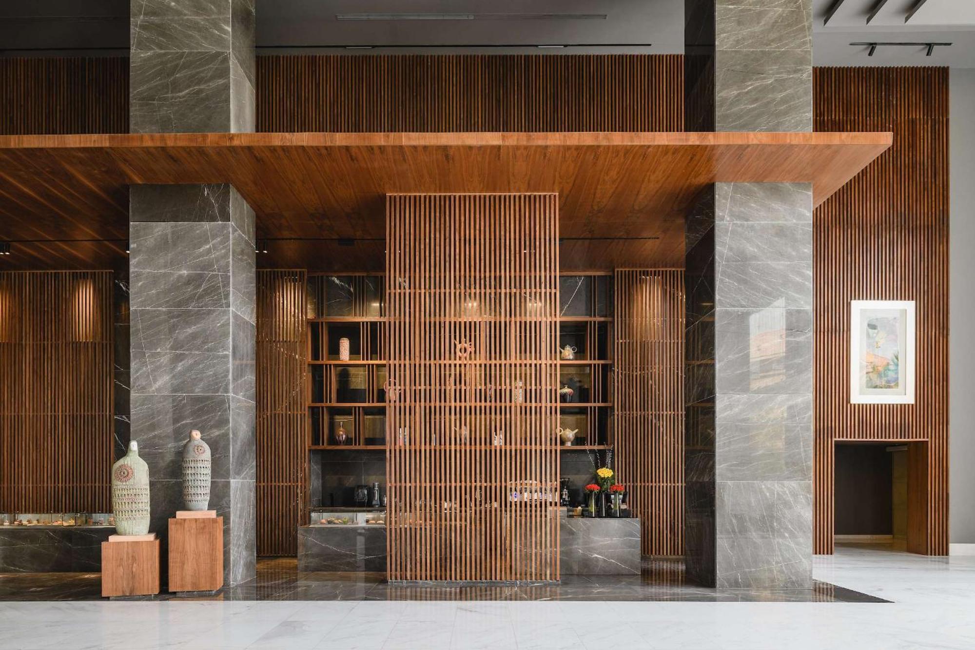 Dusit Thani Lakeview Il Cairo Esterno foto The lobby of the hotel
